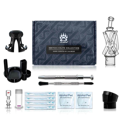 Calibear Switch 2 Ultimate Upgrade Crate — premium open combo box showing Calibear Xfinity Recycler Glass, Opal Pillar Joystick Carb Cap, 2 Ruby Terp Pearls, Switch 2 Base Tray, 3D Printed Puffco Peak adapter, Glass Holder, Pearl Claw, dab tool, and alcoh