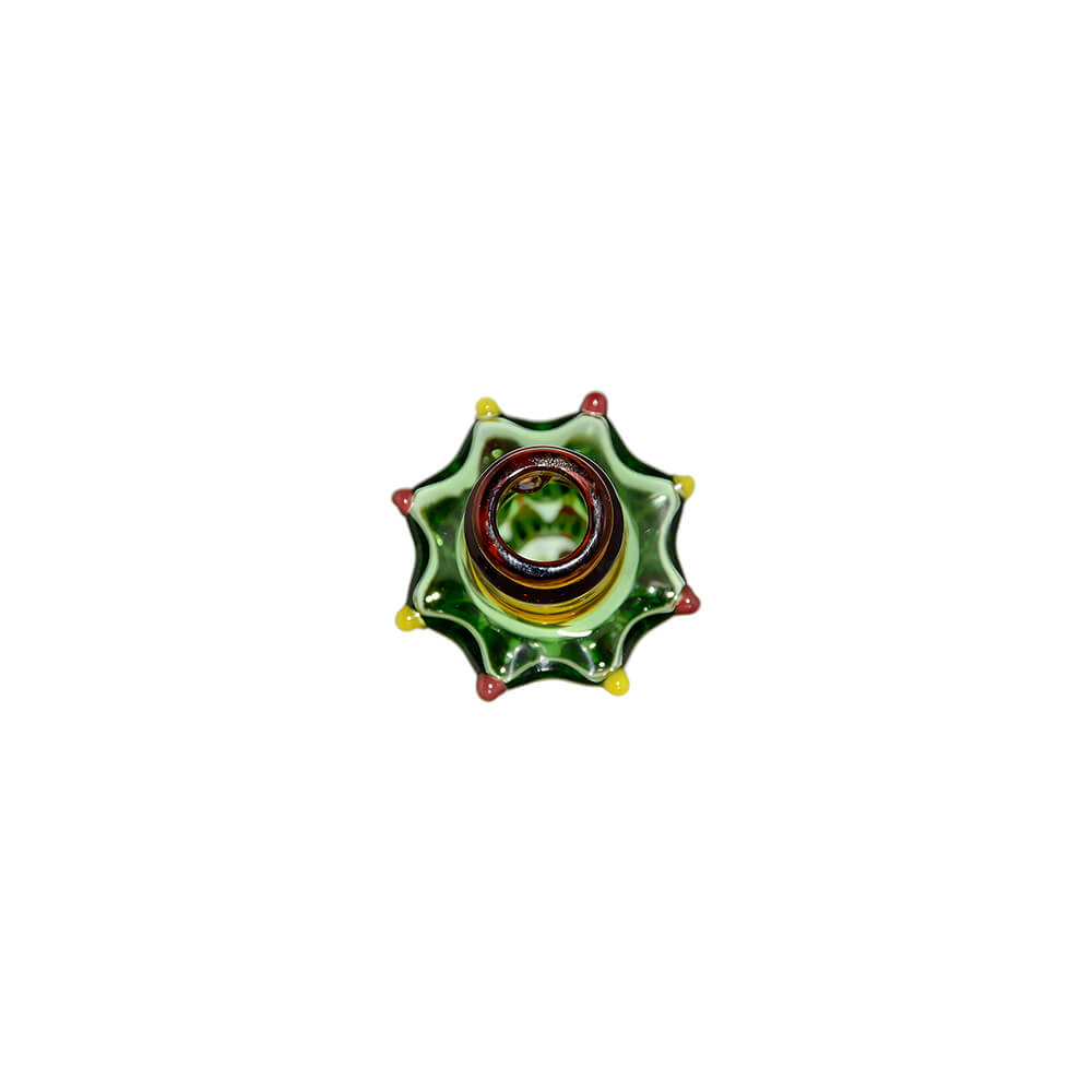 Two Calibear Pivot devices with green Christmas tree glass attachments featuring colorful ornaments on a white background.