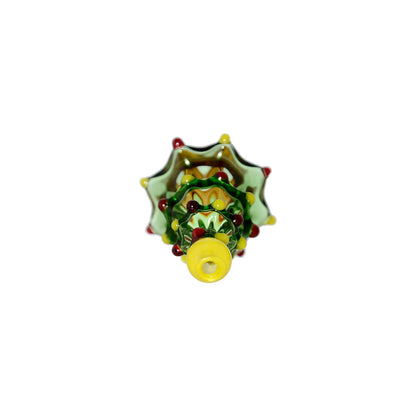 Two Calibear Pivot devices with green Christmas tree glass attachments featuring colorful ornaments on a white background.