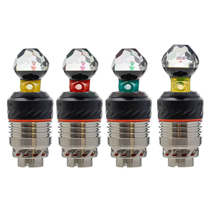 Four color variations of the Calibear Facet Opal Glass Joystick Carb Cap mounted on Puffco Peak Pro 3DXL metal chambers, showcasing diamond-cut multi-faceted clear glass tops with encased opals and colored glass stems in amber yellow, crimson red, ocean teal, and citrus green.