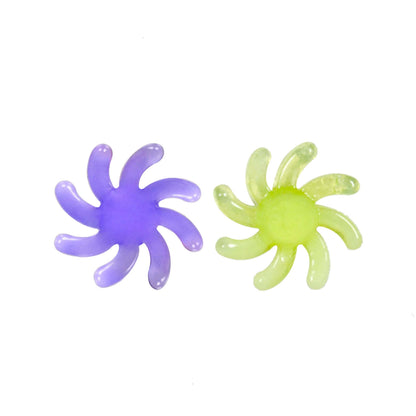 Calibear 15mm terp spinners in purple and green glass, featuring an 8-arm pinwheel design for Dr. Dabber Switch 2 and 25mm quartz bangers.