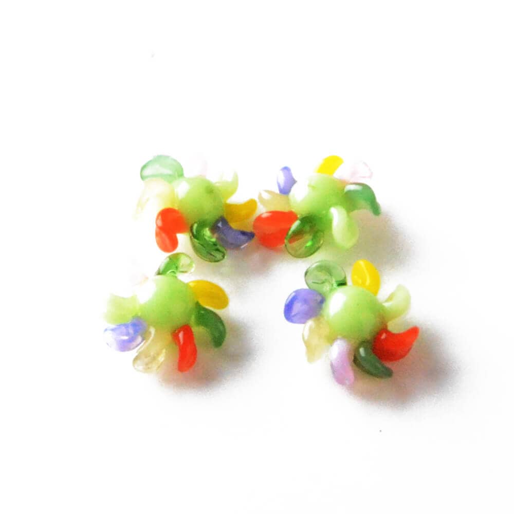 Calibear 15mm terp spinners in purple and green glass, featuring an 8-arm pinwheel design for Dr. Dabber Switch 2 and 25mm quartz bangers.